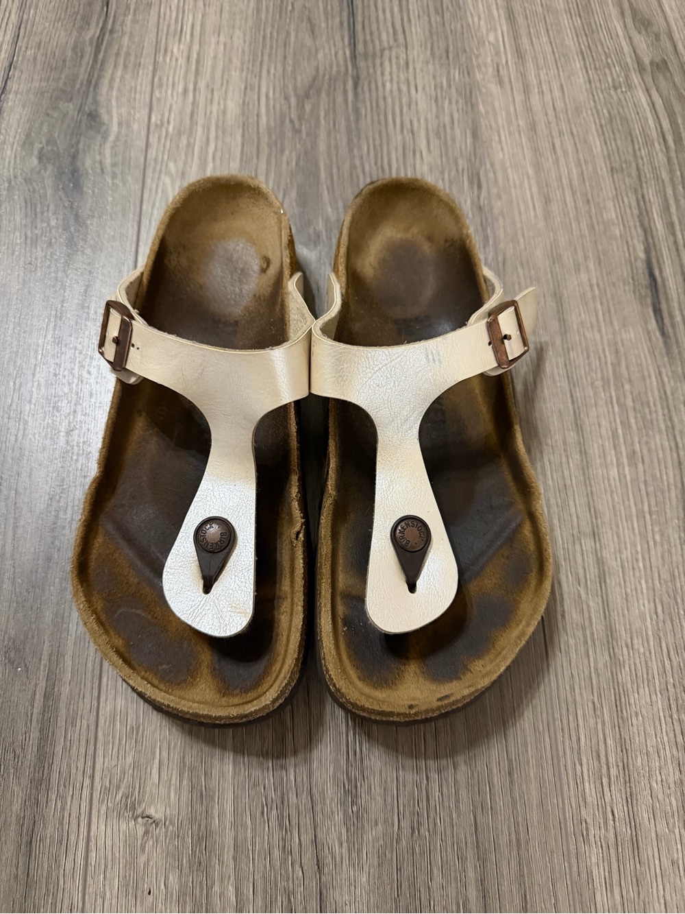 Birkenstock T-Strap Sandals in Cream with Adjustable Buckle